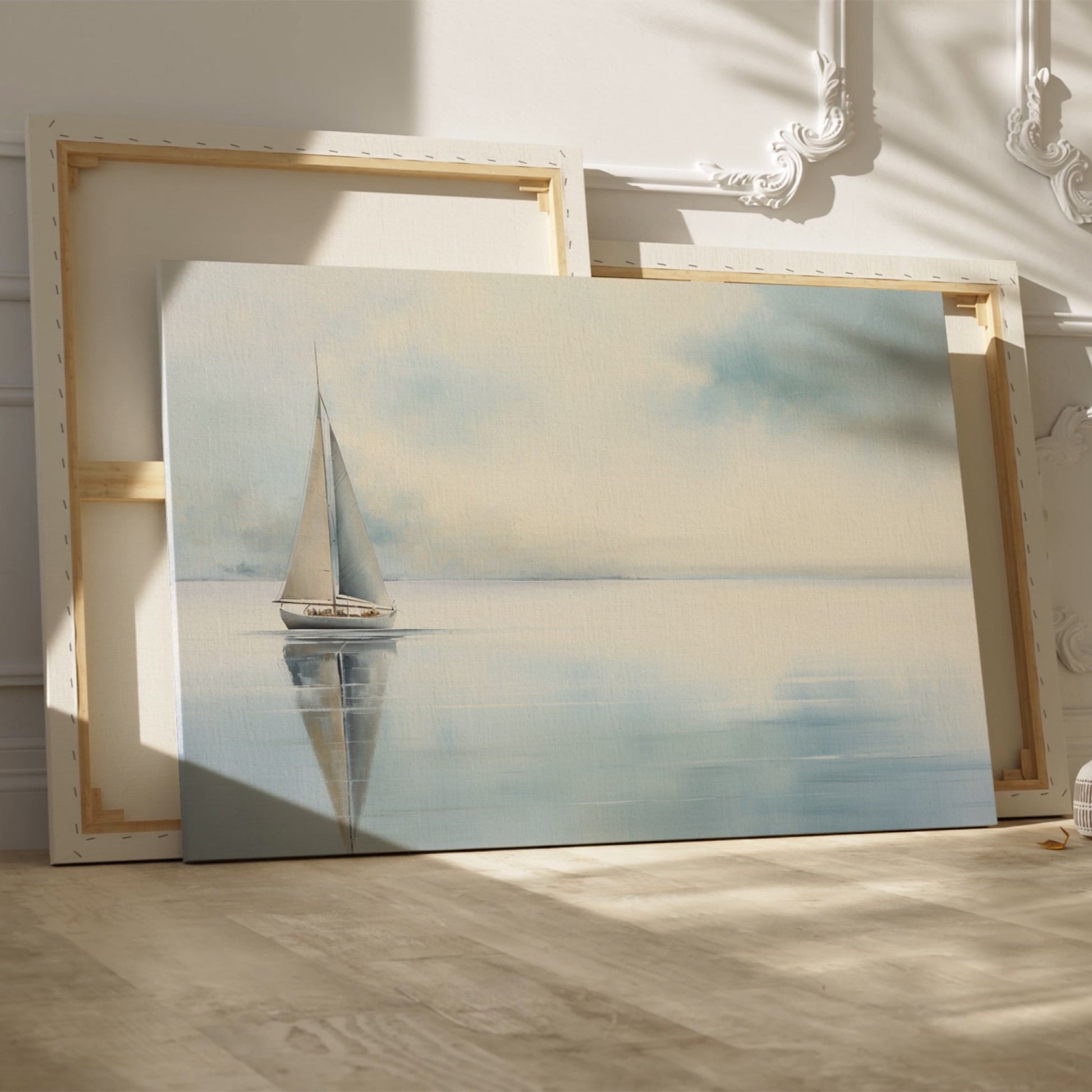 Framed canvas print of a serene sailboat with reflection on tranquil blue water