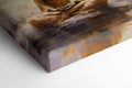 Canvas print of a meditating Buddha in warm amber and brown tones on a textured abstract background