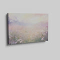 Framed canvas print of an impressionist painting of a daisy meadow at sunrise with soft pastel colours