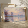 Pastel-hued landscape painting of a sunrise with reflections in the water and silhouetted trees.