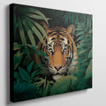 Canvas print of a tiger in a jungle with vivid green leaves around it