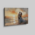 Framed canvas print of a couple embracing on a beach at sunset with vibrant warm colours and soft lighting
