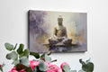 Framed canvas print depicting a serene Buddha in meditation, with textured strokes and a peaceful color palette