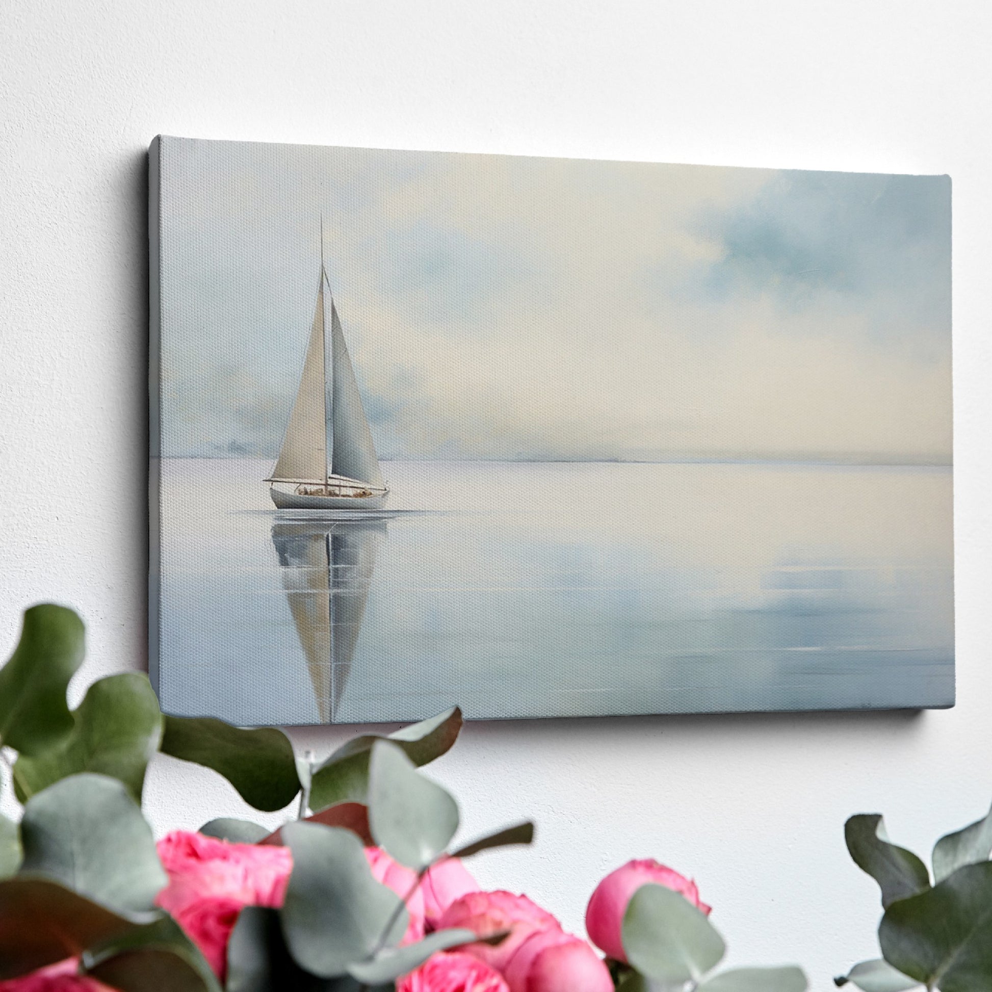 Framed canvas print of a serene sailboat with reflection on tranquil blue water