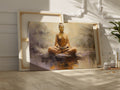 Canvas print of a meditating Buddha in warm amber and brown tones on a textured abstract background