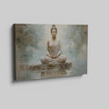 Framed canvas print of a meditative Buddha in serene, neutral tones