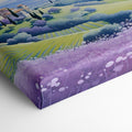 Framed canvas print of stylised Tuscan village landscape with pastel countryside and purple floral field