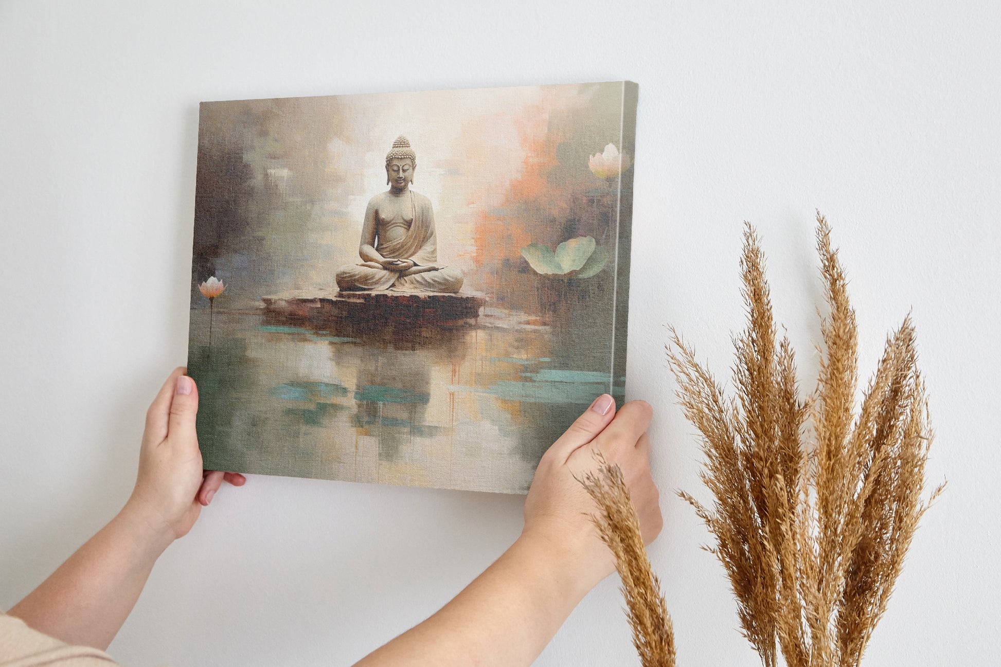 Framed canvas print of a serene Buddha in meditation with abstract watercolour lotus flowers and reflections