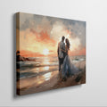 Framed canvas print of a couple embracing on a beach at sunset with vibrant warm colours and soft lighting