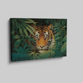 Canvas print of a tiger in a jungle with vivid green leaves around it