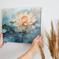 Framed canvas print of a blooming lotus flower with lush blue and orange hues