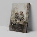 Framed canvas print of two monkeys contemplating over a birthday cake on a rustic backdrop