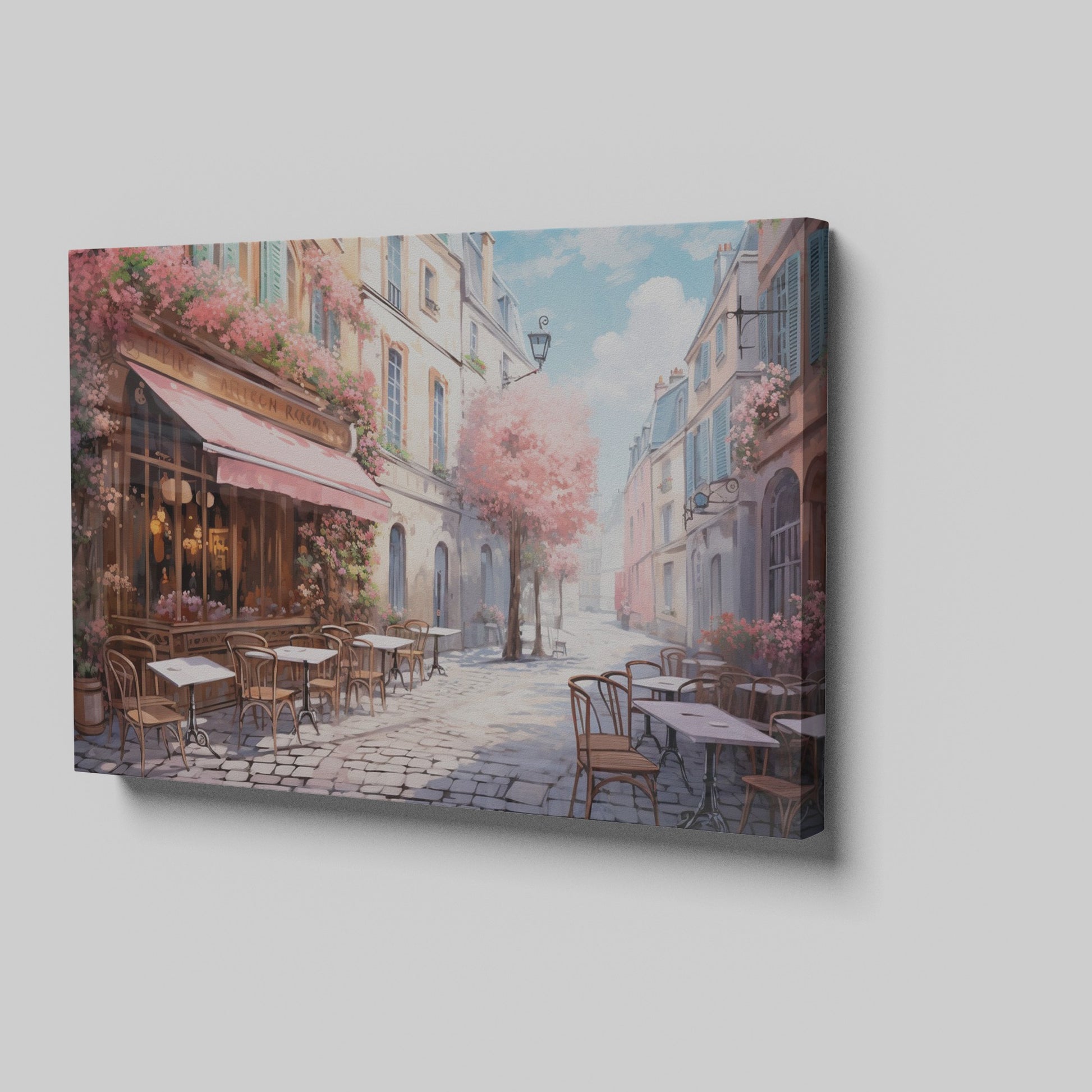 Framed canvas print of a picturesque Parisian alley with cherry blossoms and a street cafe scene in springtime