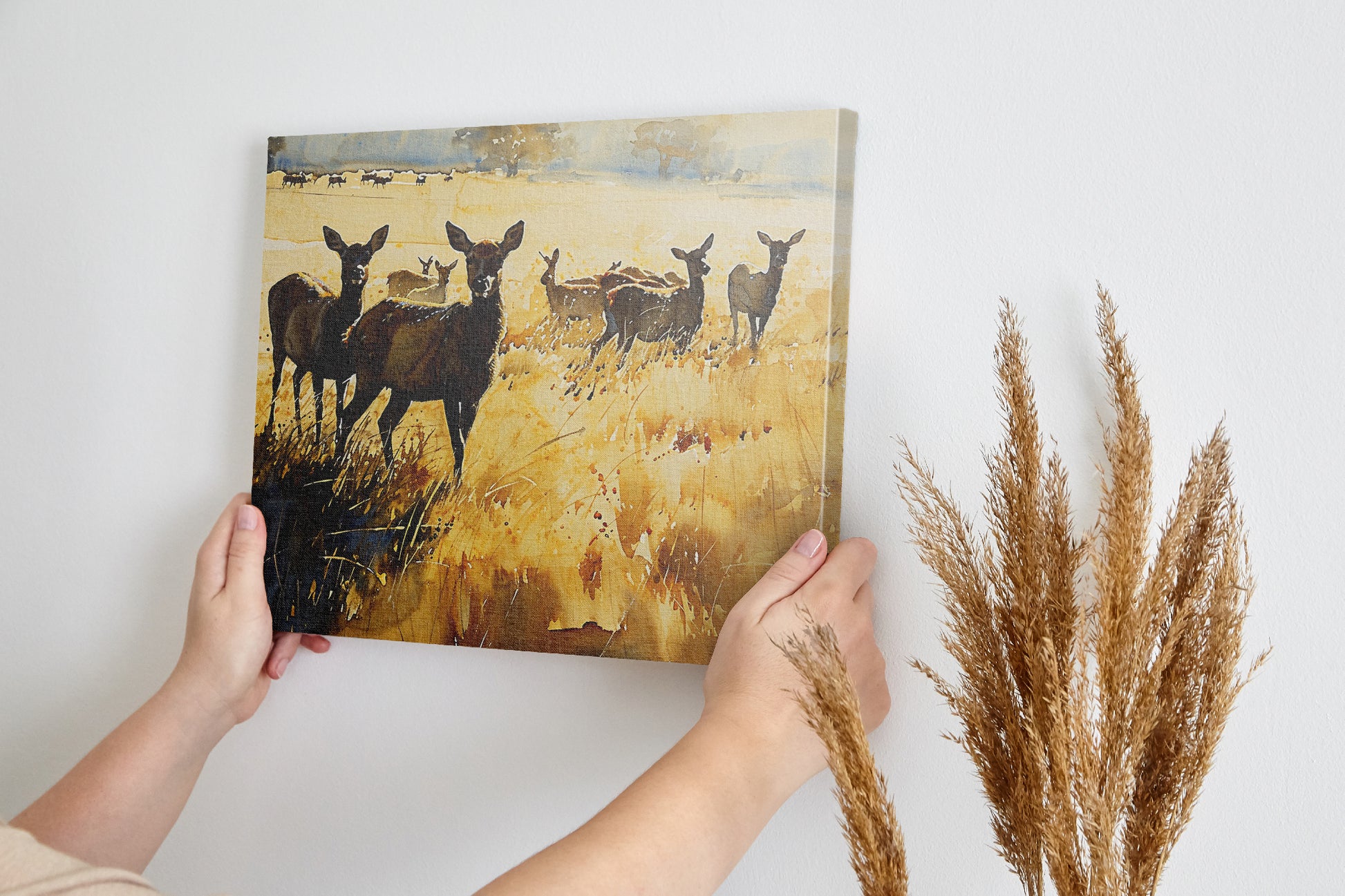 Framed canvas print of a deer herd in a golden autumn landscape with splattered paint effect.