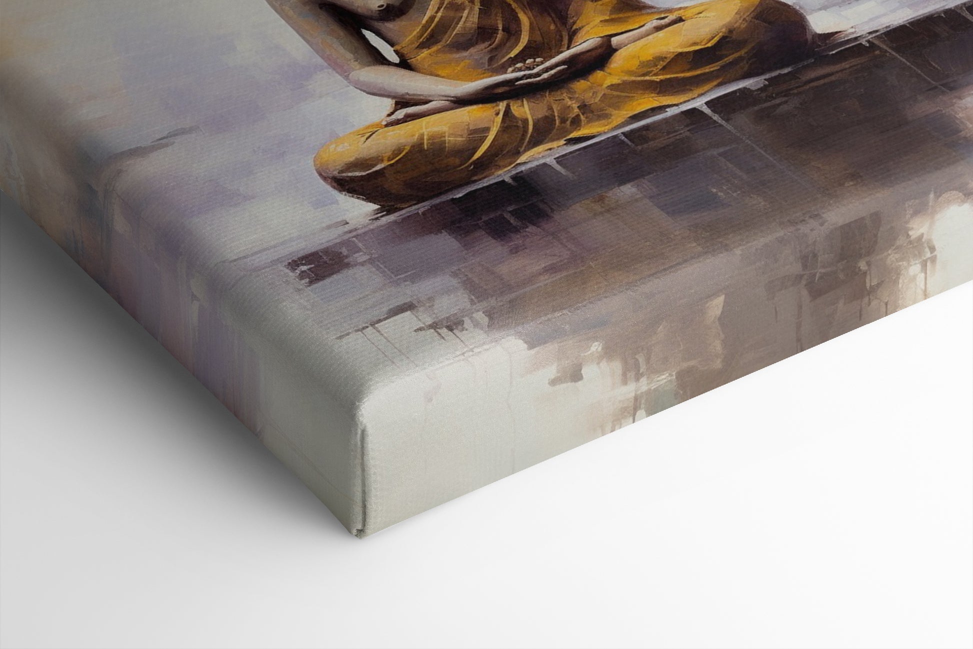 Framed canvas print of a meditative Buddha figure in golden and beige tones with a serene abstract background