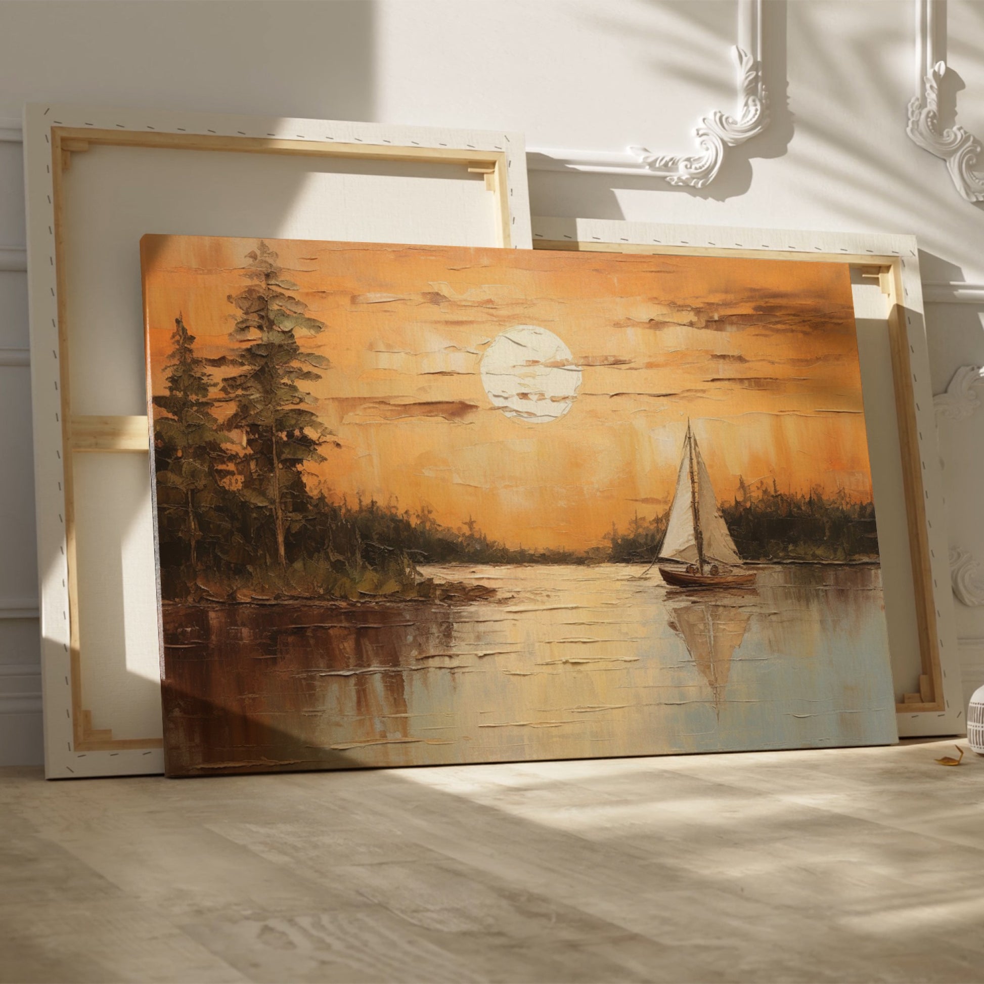 Canvas print of a sunset with orange skies, sailboat on calm lake, and tree silhouettes