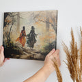 Watercolour painting of two figures walking through an autumn forest with bright orange leaves and birds in flight