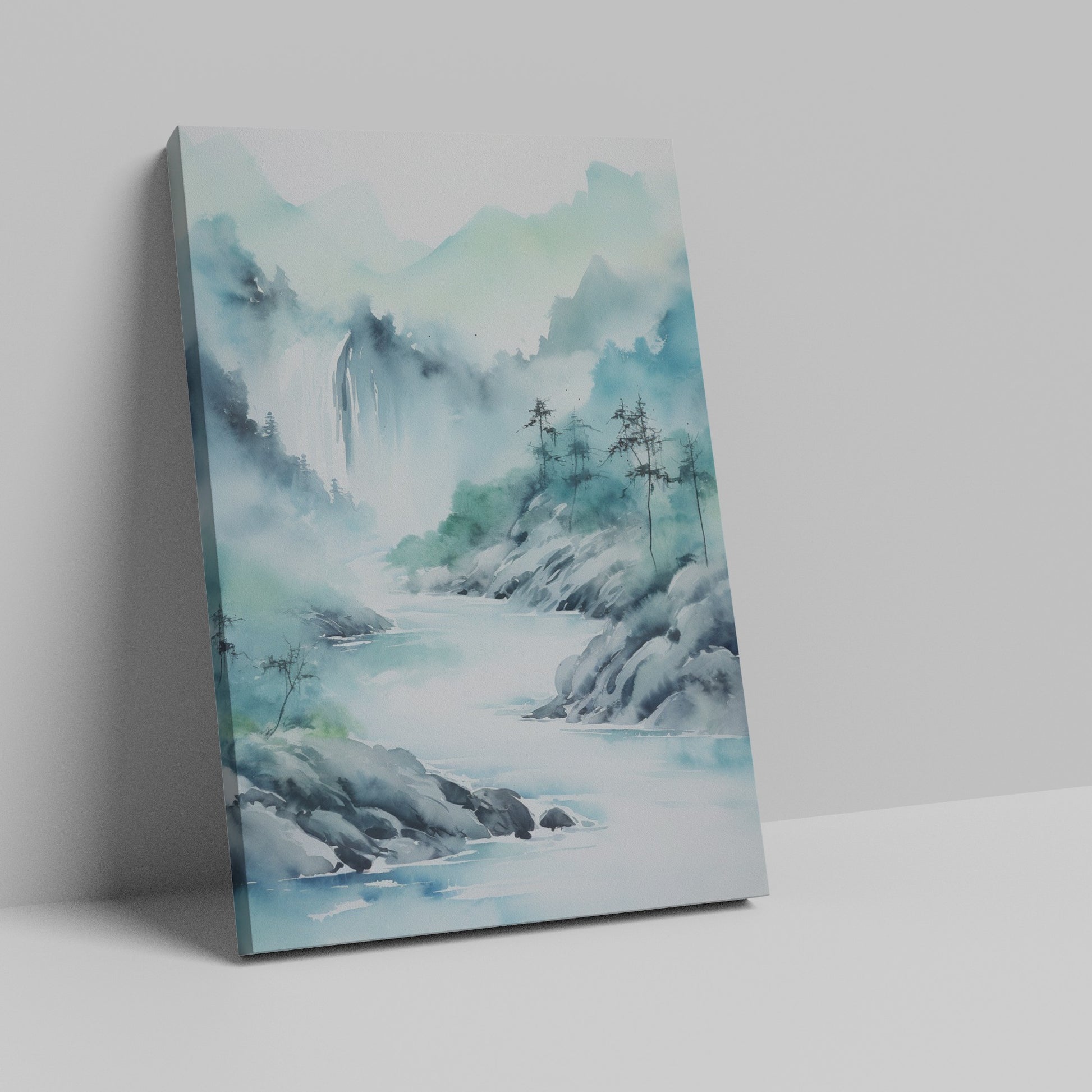 Framed canvas print of a tranquil watercolour painting depicting misty mountains and a serene river landscape in soft blue and green hues.