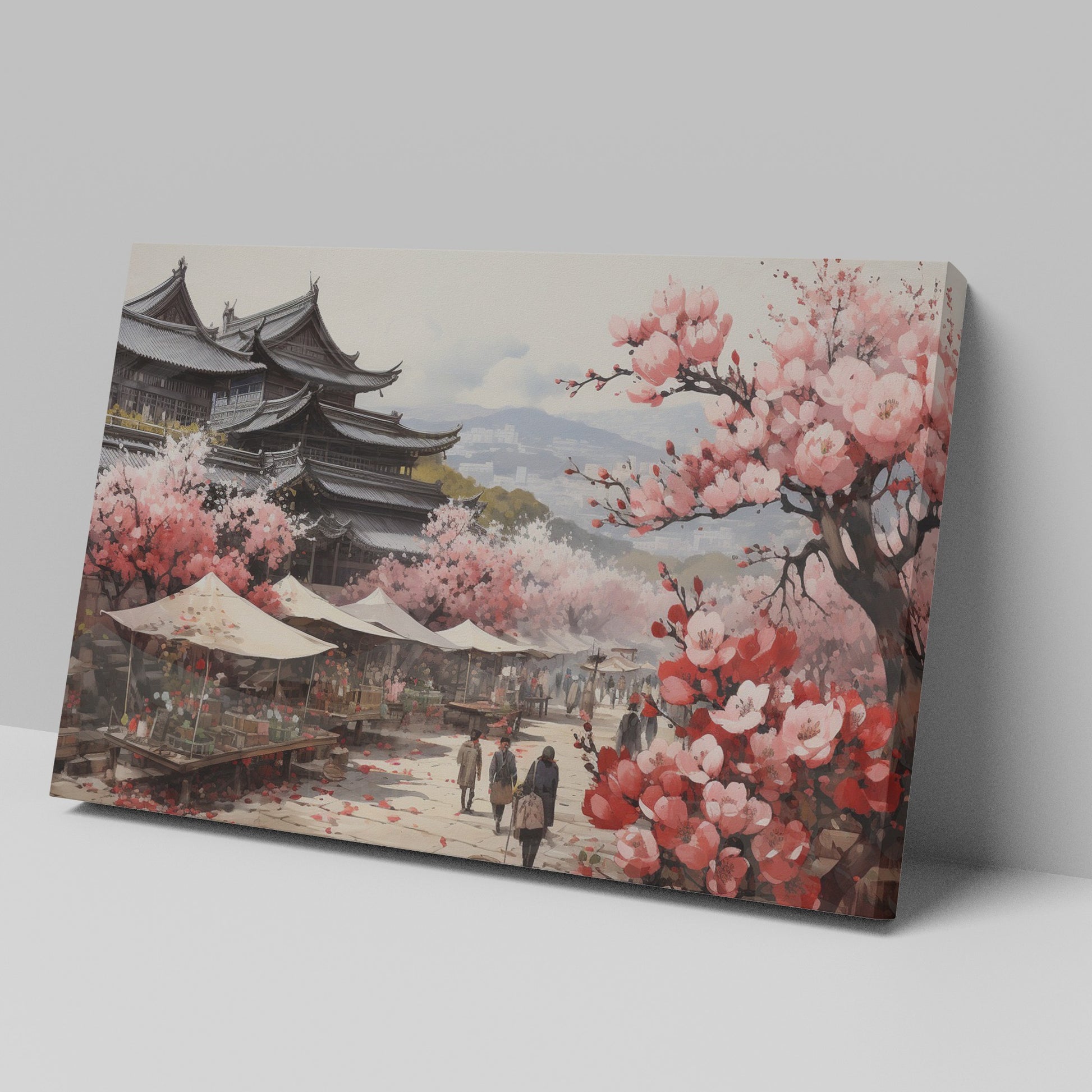 Framed canvas print of a traditional Japanese town during cherry blossom season with pink florals and historic architecture