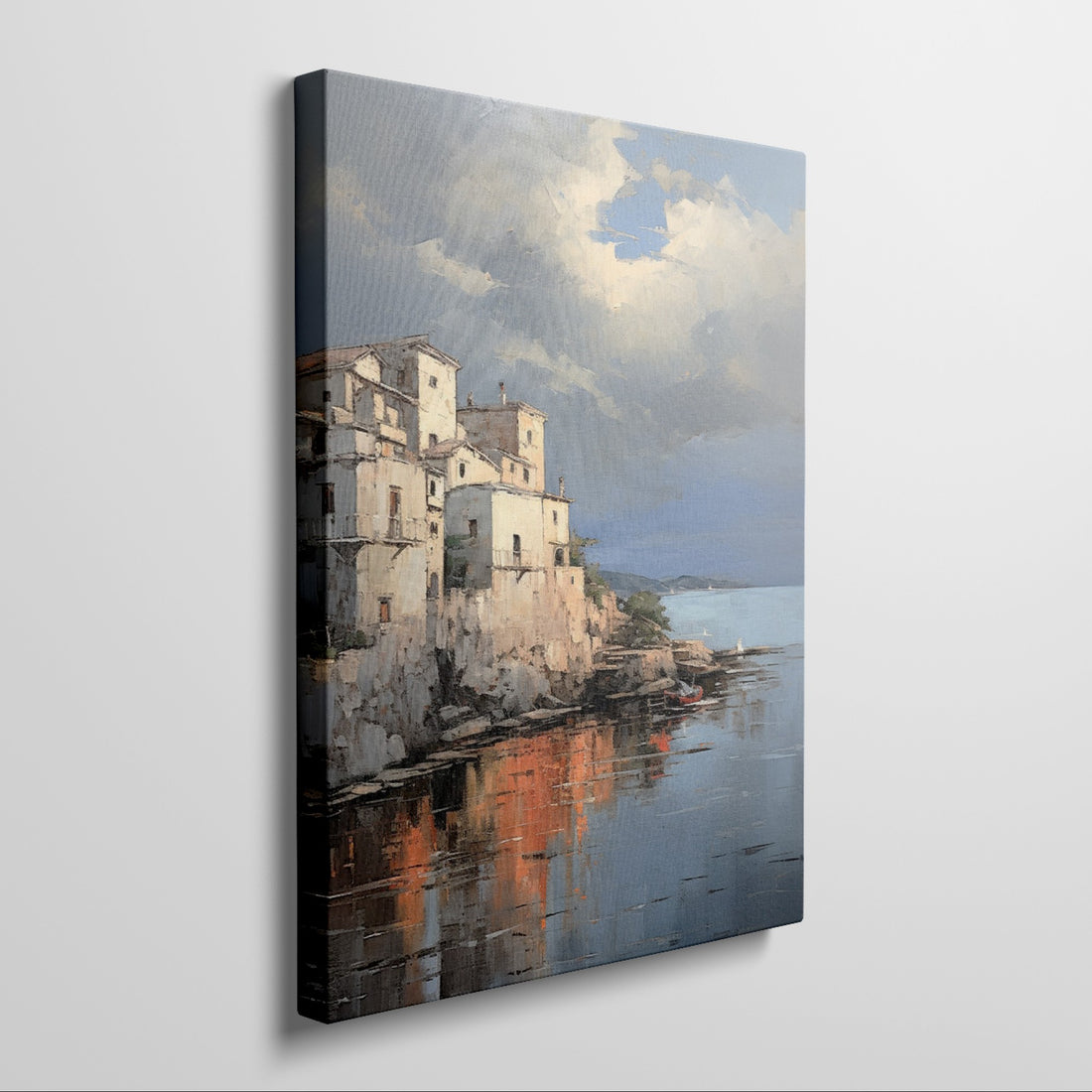 Framed canvas print of a Mediterranean coastal village during sunset with golden reflections on water