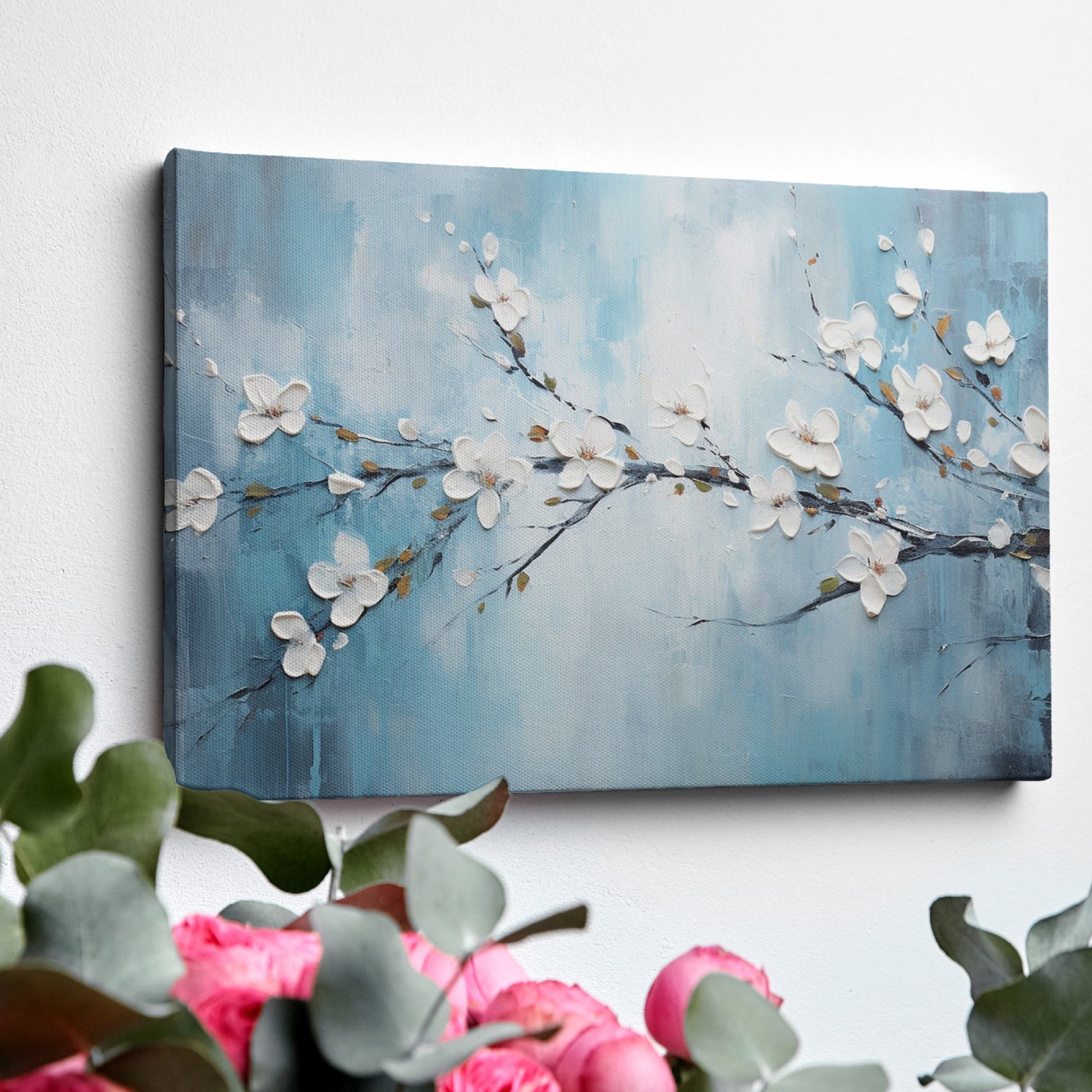 Framed canvas print of serene cherry blossoms with impasto texture on blue background