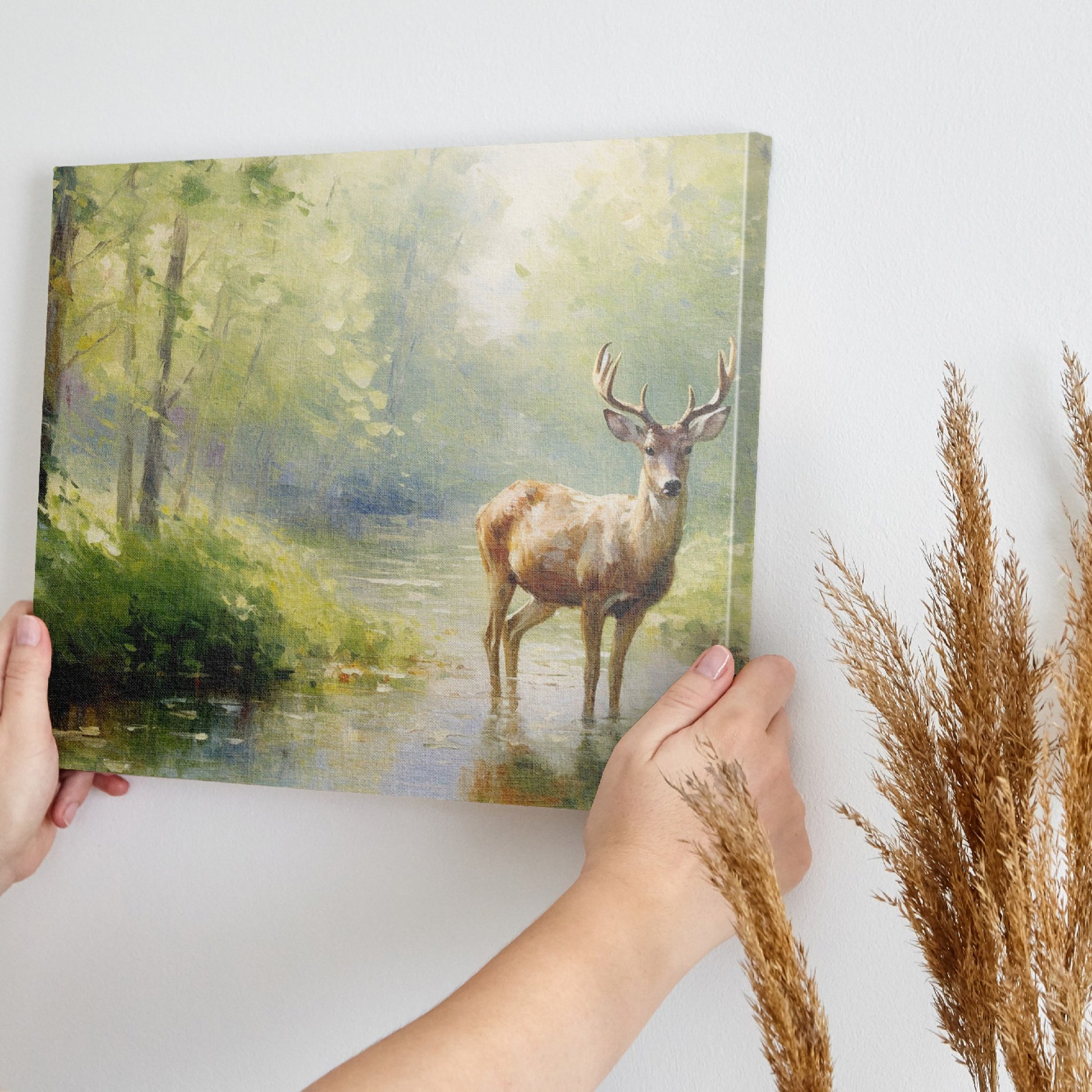 Framed canvas print depicting an impressionistic scene of a deer in a lush green forest with sunlight filtering through