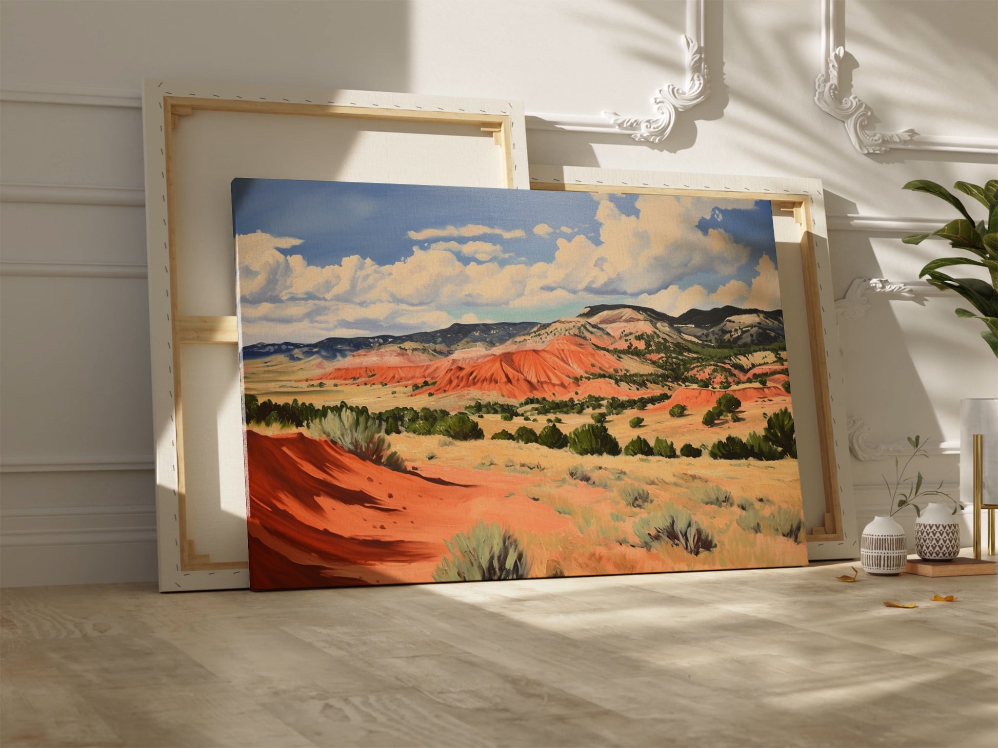 Framed canvas print of impressionistic desert hills with vivid red, earthy beige, and lush green tones