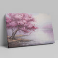 Framed canvas print of an impressionistic cherry blossom tree by a tranquil lake with soft pastel colors