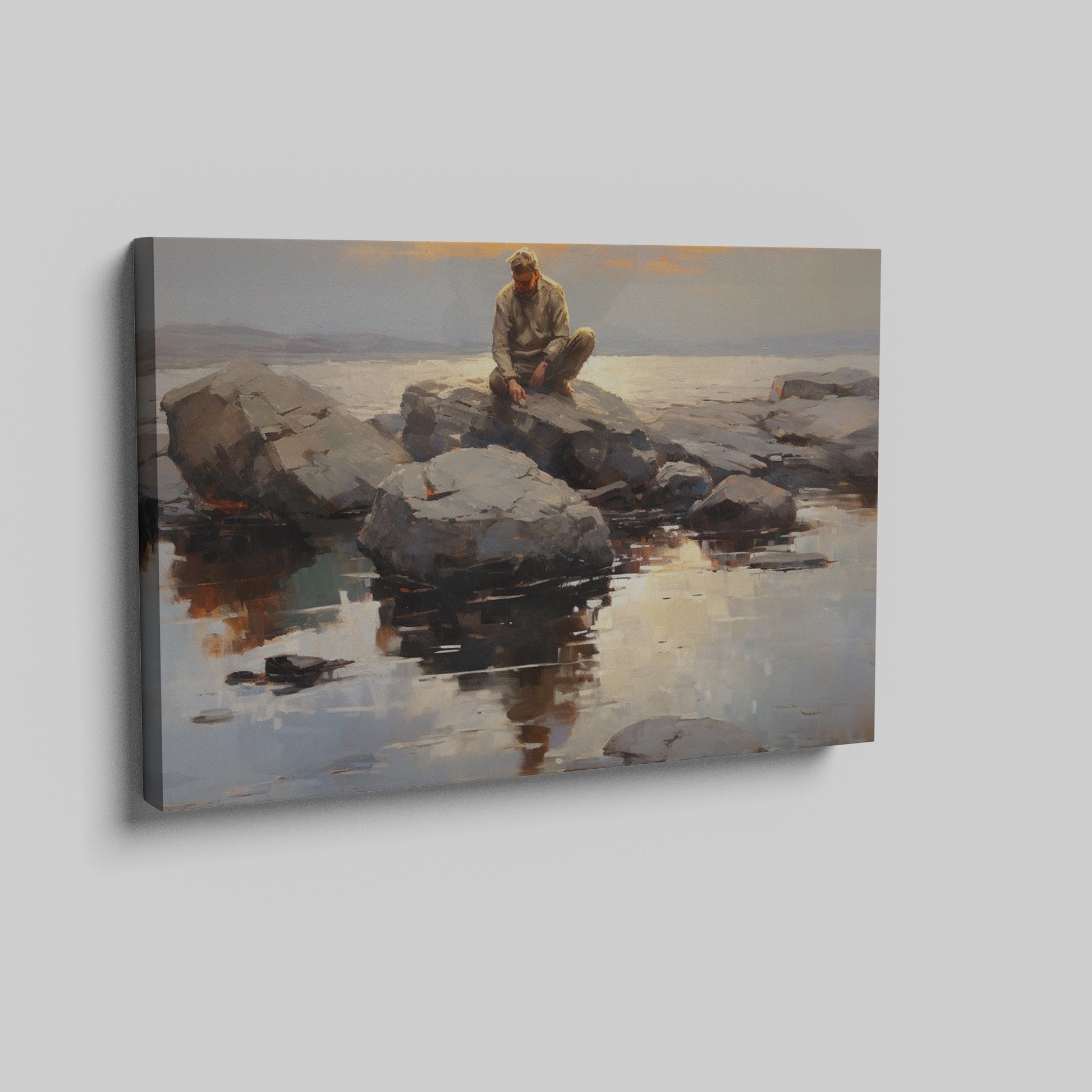 Framed canvas print of serene seascape with man sitting on rocks at sunset