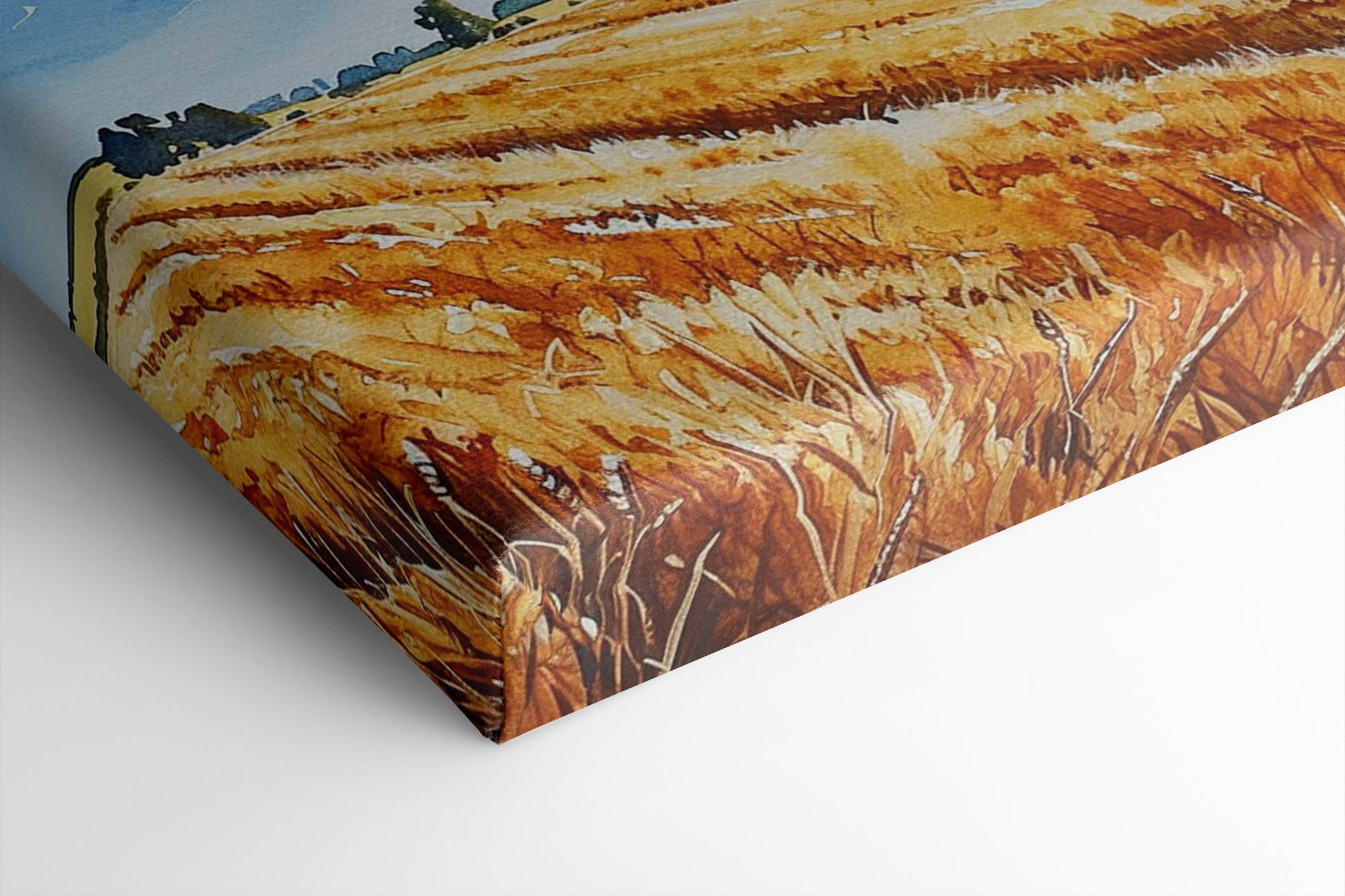 Framed canvas print of golden wheat fields under a blue sky in a rural landscape