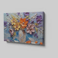 Framed canvas print of embossed and textured colourful flowers in impasto style