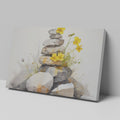 Framed canvas print of Zen stones balanced in watercolour with yellow flowers