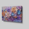 Framed canvas print of vibrant impasto-style abstract flowers in orange, lavender, and blue