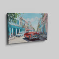 Framed canvas print of a vibrant Cuban street with vintage cars and colourful buildings