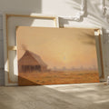 Framed canvas print of golden sunrise with a thatched cottage in a tranquil countryside scene