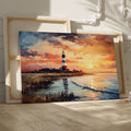 Framed canvas print of an impressionist lighthouse by the sea at sunset with vibrant colours