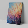 Framed canvas print of abstract pampas grass in sunset colours against a blue sky