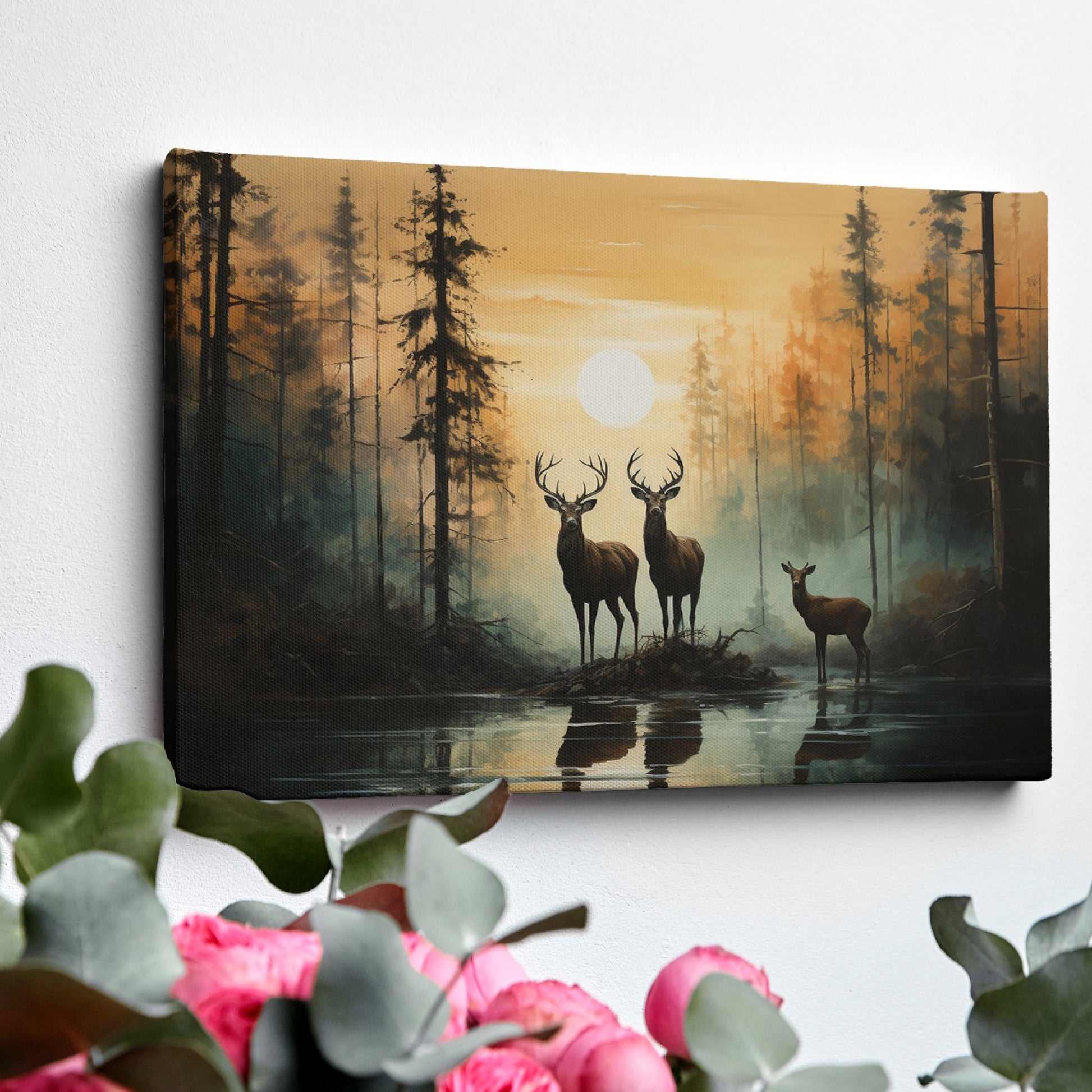 Framed canvas print of deer silhouetted against a forest sunset with reflections on water