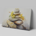 Framed canvas print of Zen rocks stacked with yellow flowers in watercolour