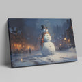 Framed canvas print of a snowman in a winter evening townscape with warm street lights and snowfall