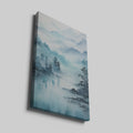 Framed canvas print of a tranquil watercolour landscape with misty blue mountains and serene lake