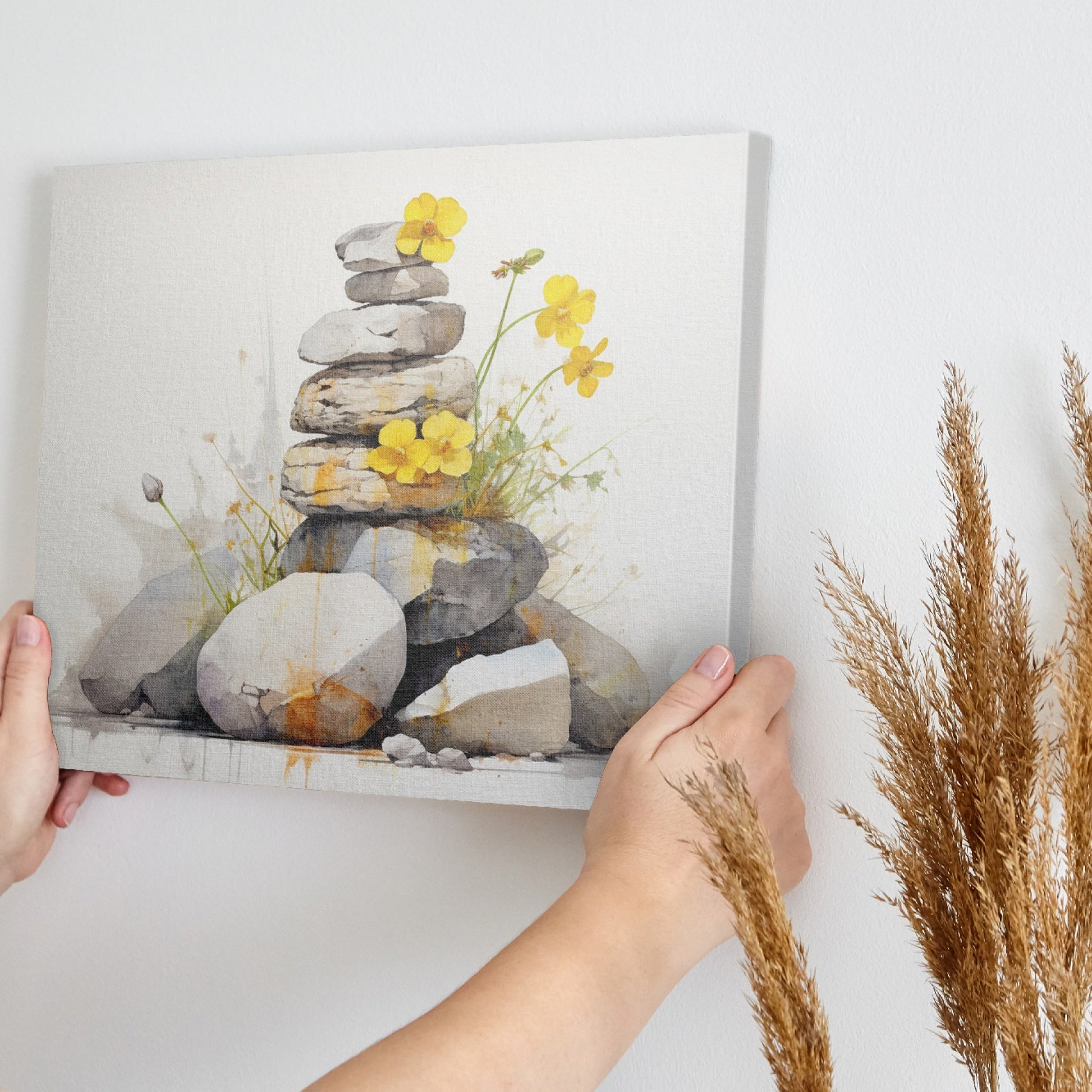 Framed canvas print of Zen stones balanced in watercolour with yellow flowers