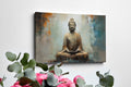 Framed canvas print of a meditative Buddha statue with abstract background in warm and neutral tones