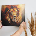 Framed canvas print of a resplendent lion with a fiery mane in earthy tones