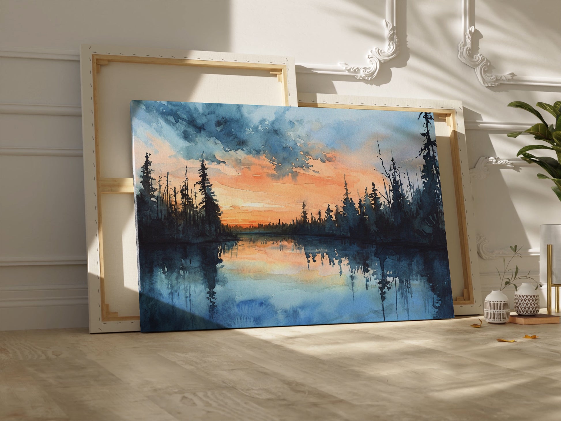 Framed canvas print of a tranquil watercolor landscape depicting a serene lakeside at sunset with reflections of woodland