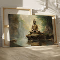 Framed canvas print of a serene Buddha statue in a Zen garden with waterfall