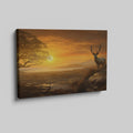 Framed canvas print of a majestic stag in a savanna sunset landscape with warm orange hues