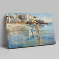 Framed canvas print of a sunlit Mediterranean beach with a mother and child