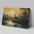 Framed canvas print of a majestic stag against a forest lake at sunrise with orange skies