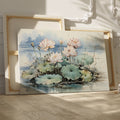 Framed canvas print of serene lotus pond with blooming flowers and gentle hues